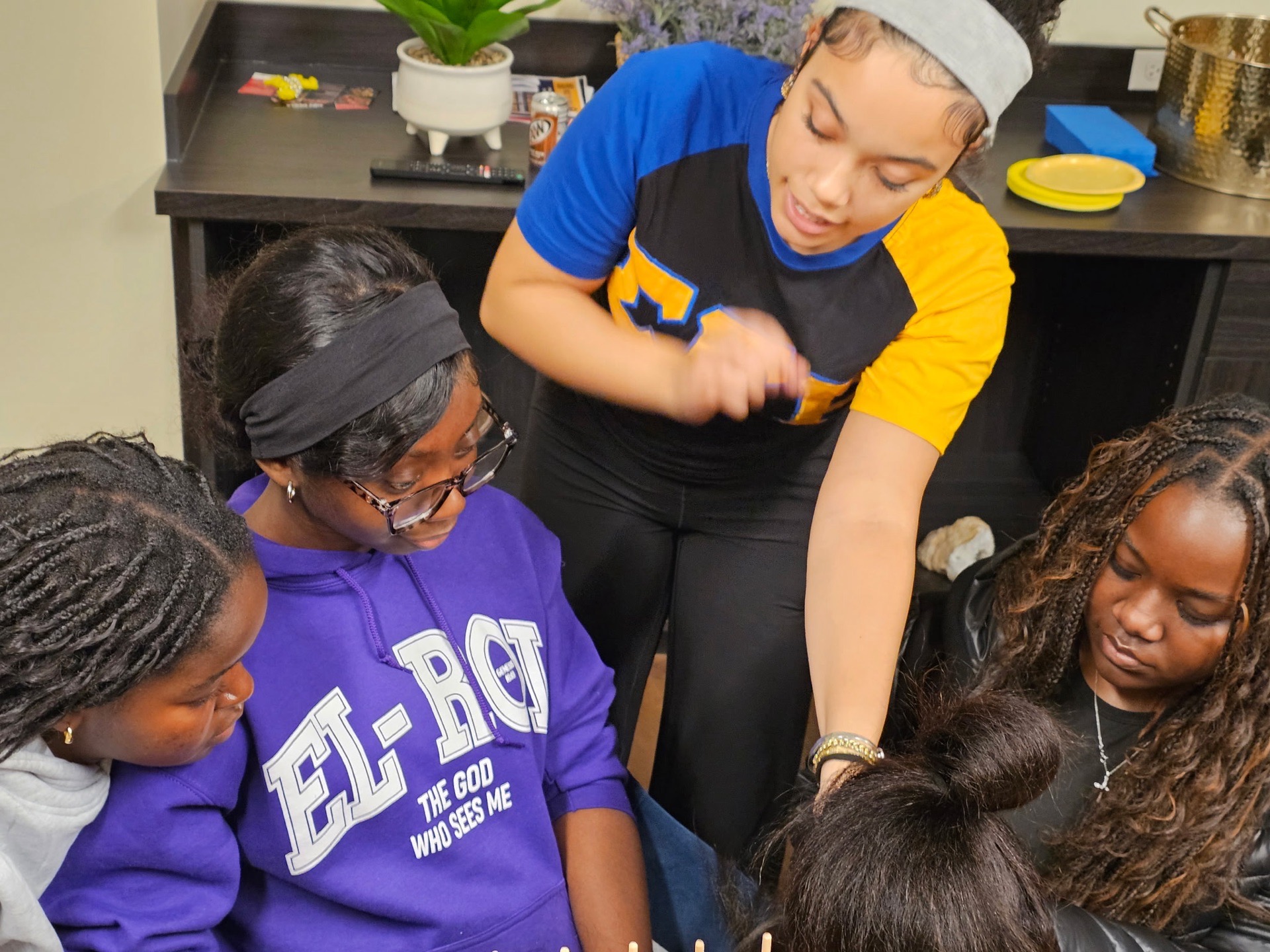 Hands-on braiding instruction
